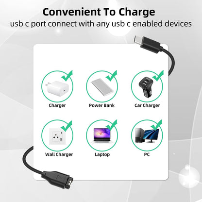 Garmin watch charging cable connected to a black Garmin watch