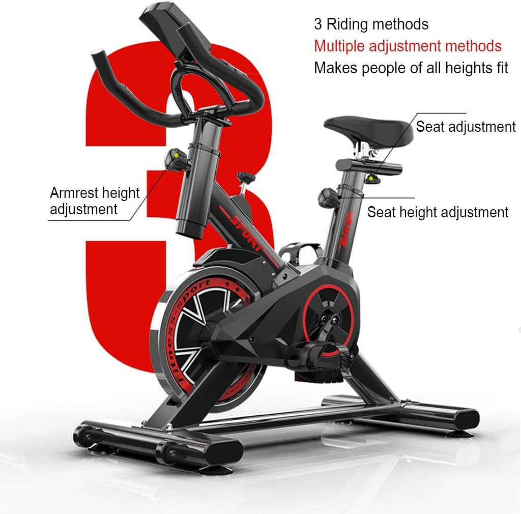 Black exercise bike flywheel and belt drive mechanism