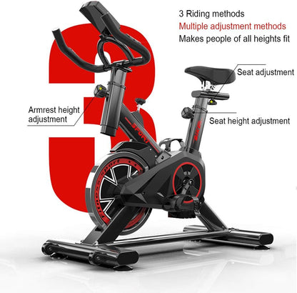 Black exercise bike flywheel and belt drive mechanism