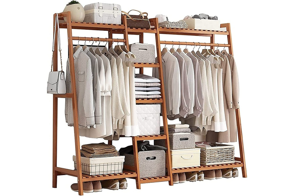 Side angle of bamboo clothes rack with shoe bench and shelves