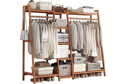 Side angle of bamboo clothes rack with shoe bench and shelves