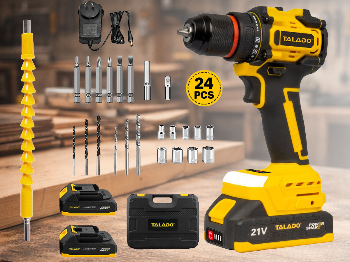 Yellow cordless drill driver resting on workshop bench