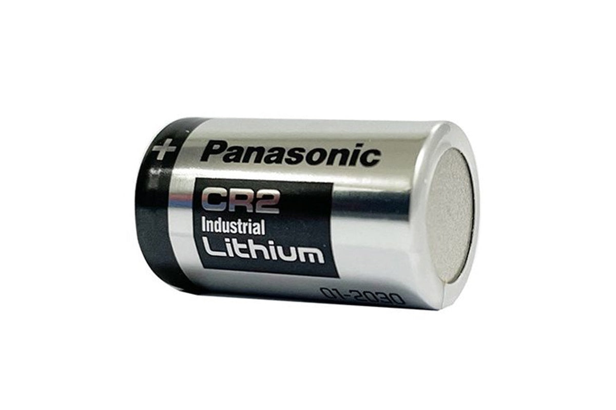 Side view of CR2 battery with button top pressure terminal visible