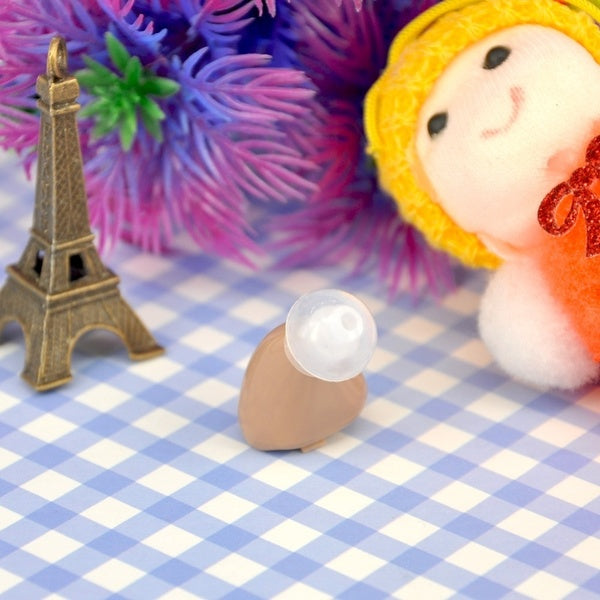Close-up of hearing aid amplifier earplug in different sizes