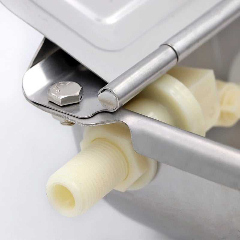 Stainless steel surface of automatic drinking bowl water trough bowl close up