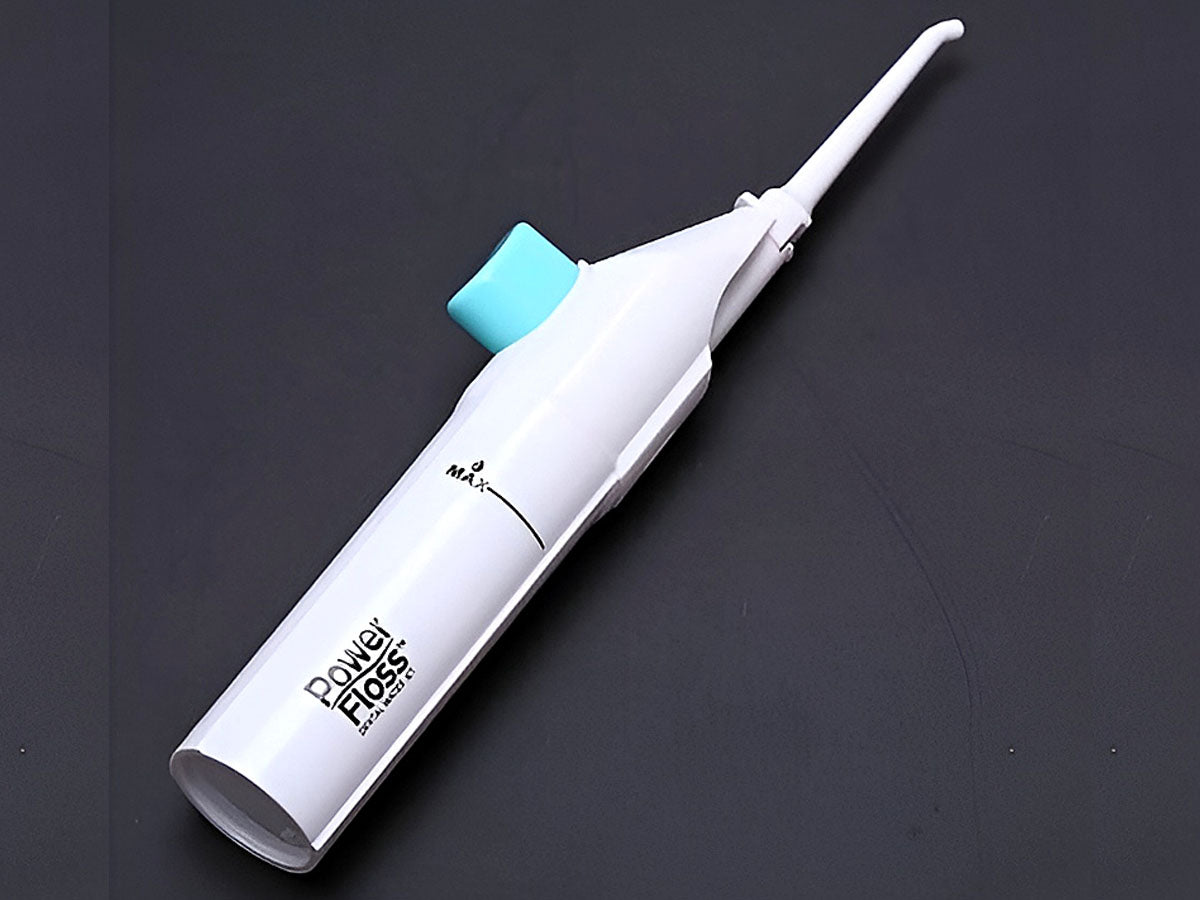 Side view of dental water flosser with air infusion feature