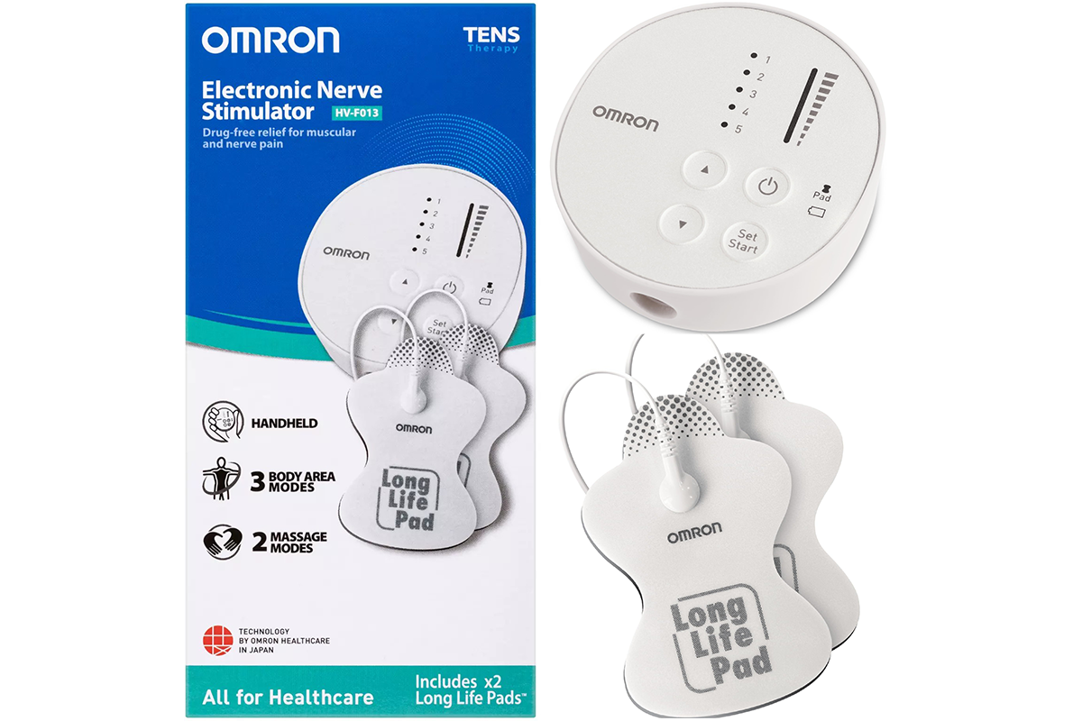 Side angle of Omron TENS machine highlighting control buttons