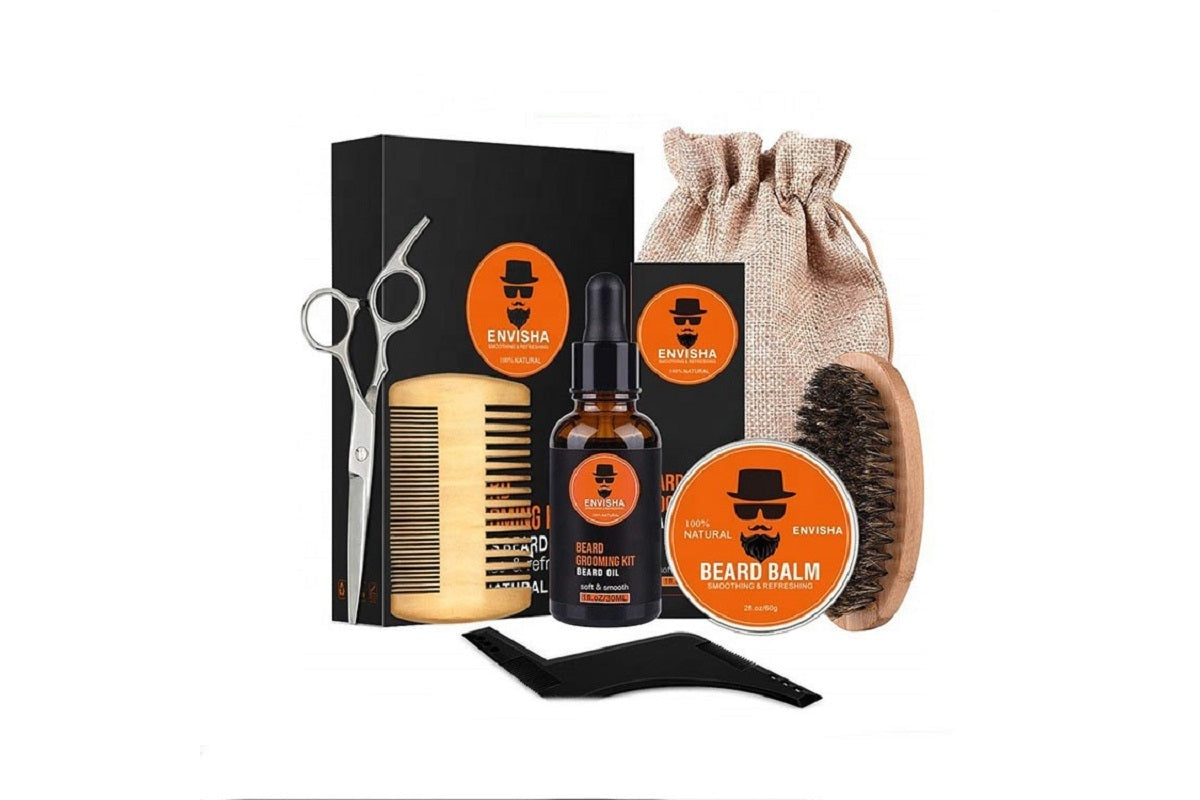 Close up of beard grooming kit wooden comb and boar bristle brush