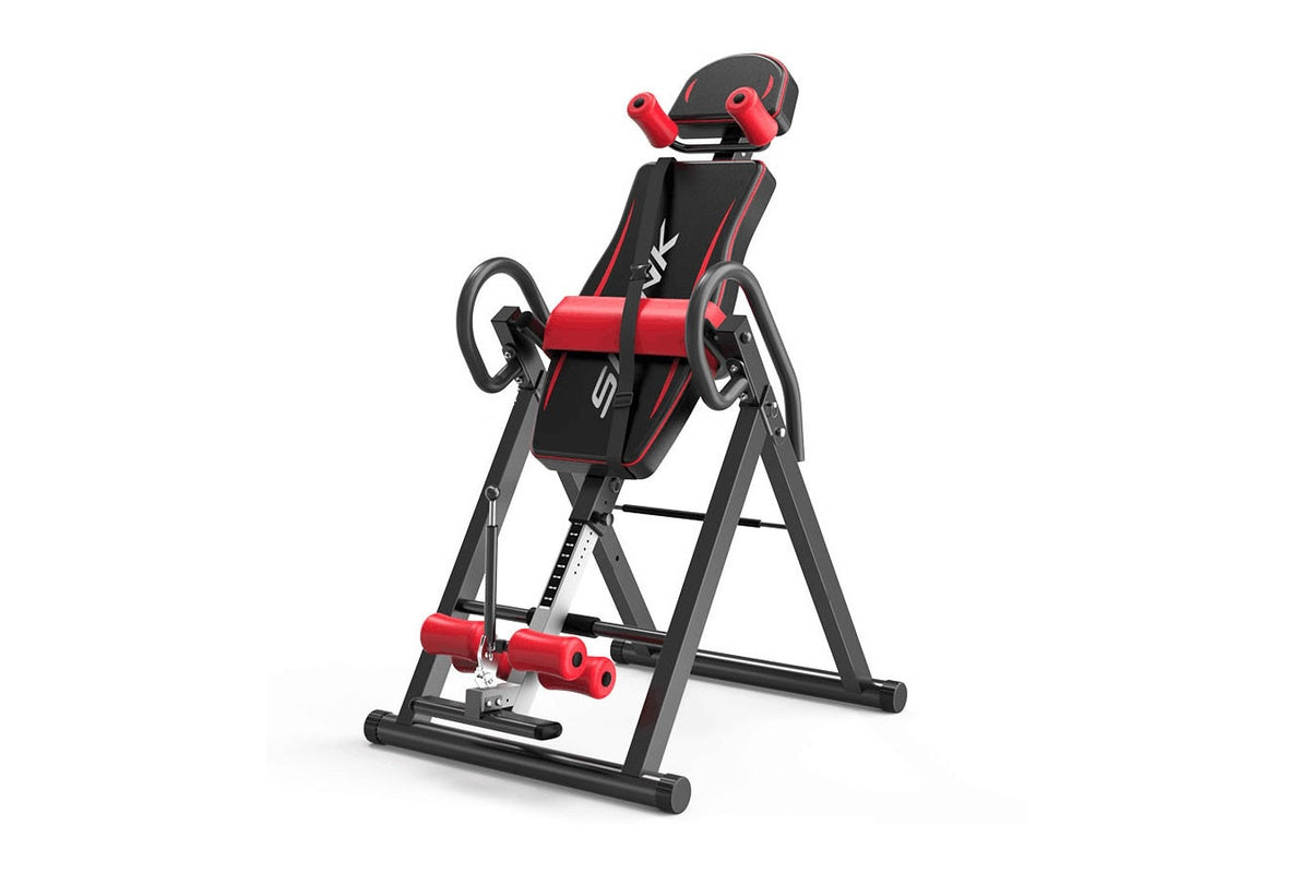 Black and red inversion table with padded ankle straps