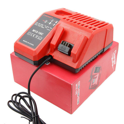 Battery and charger set placed on a wooden workbench in workshop