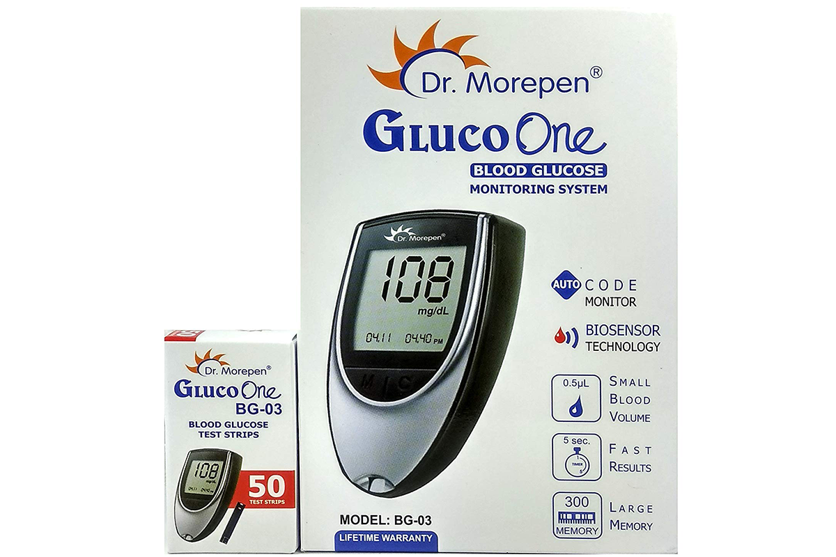 Close up of Blood Glucose Meter test strip slot with strip inserted