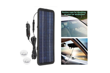 Close-up of solar car battery charger 12V with suction cups attached