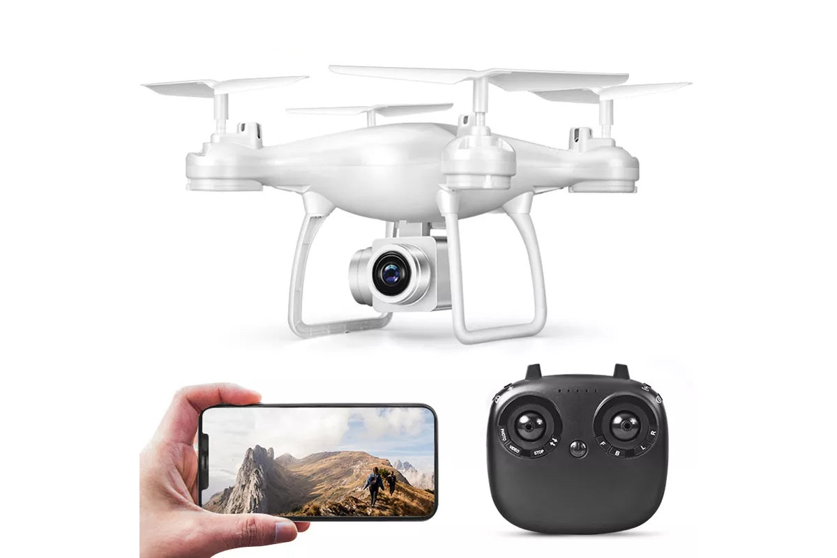 Side angle of drone with camera in flight over grass