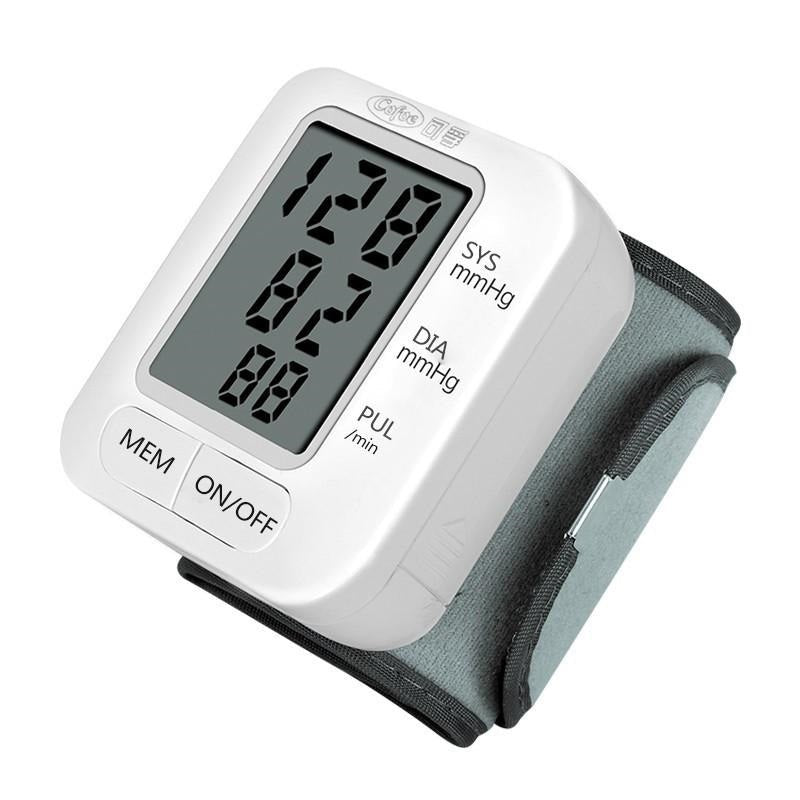 Wrist blood pressure monitor showing large LED display