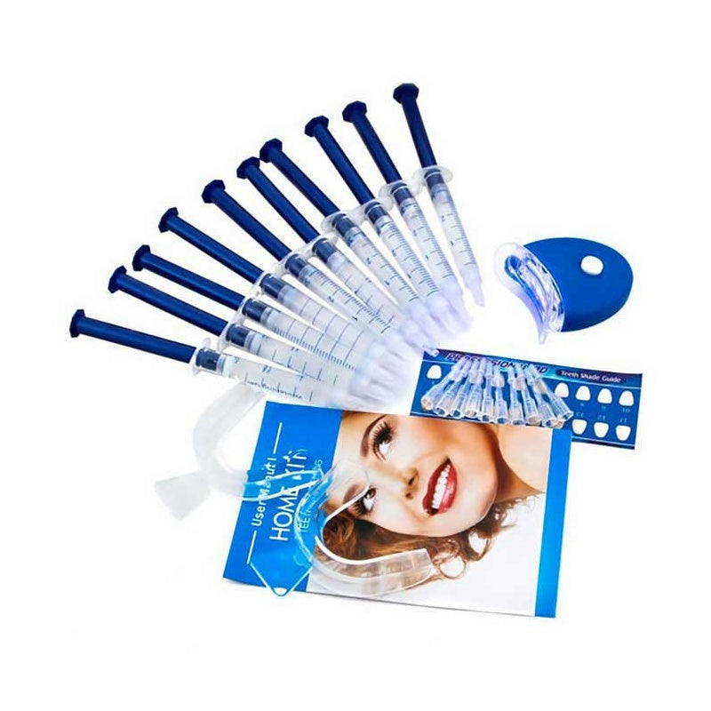 Teeth whitening kit with blue LED light and gel syringe