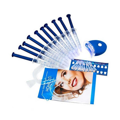 Teeth whitening kit with blue LED light and gel syringe