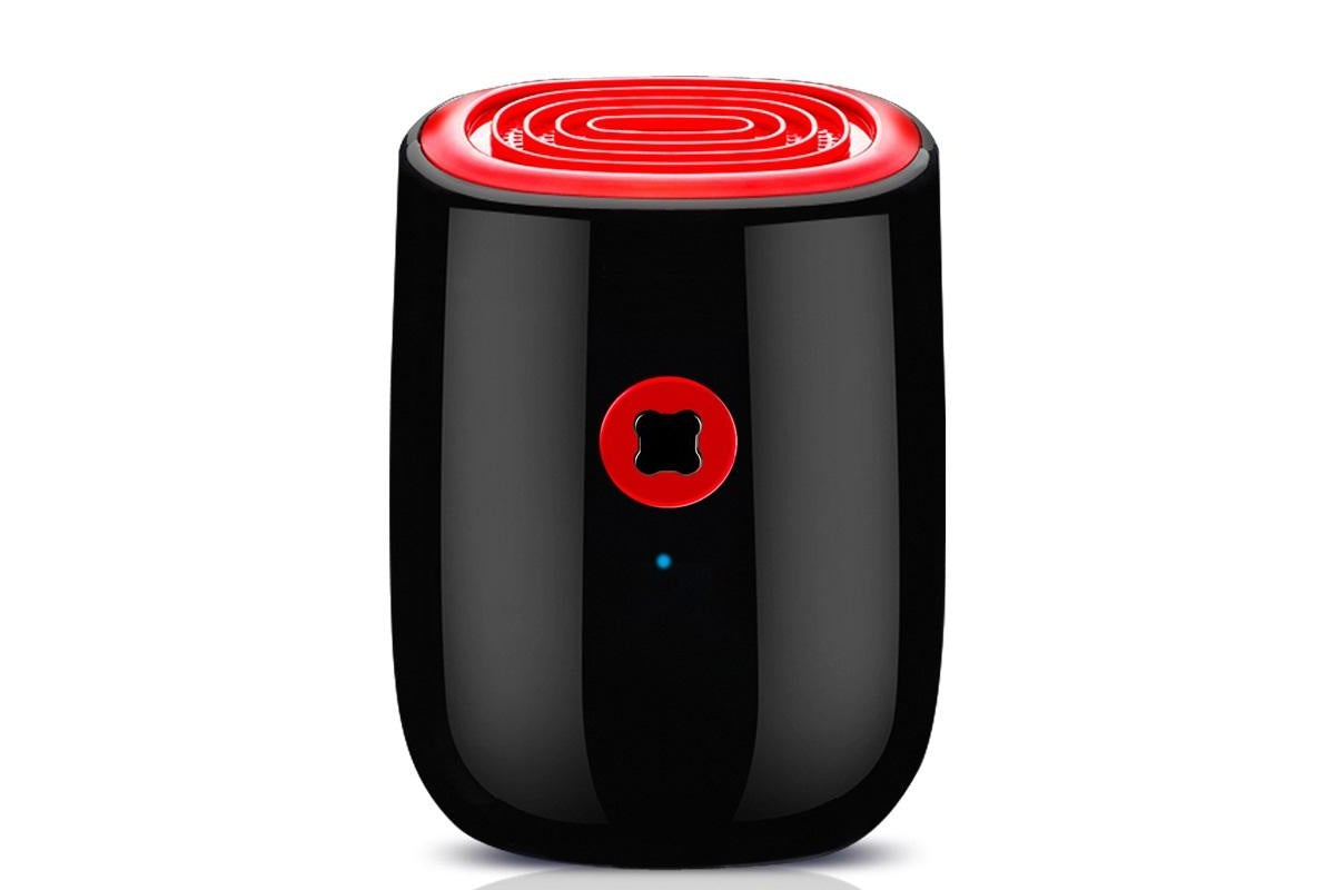 Side angle of portable dehumidifier highlighting water tank