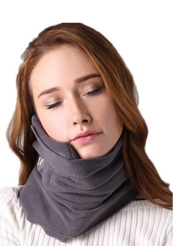 Top view of grey travel pillow showing shape and size