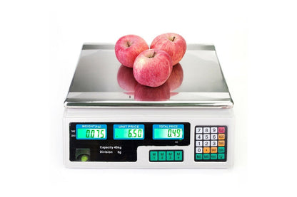 Close up of digital price computing scales keypad and unit price buttons