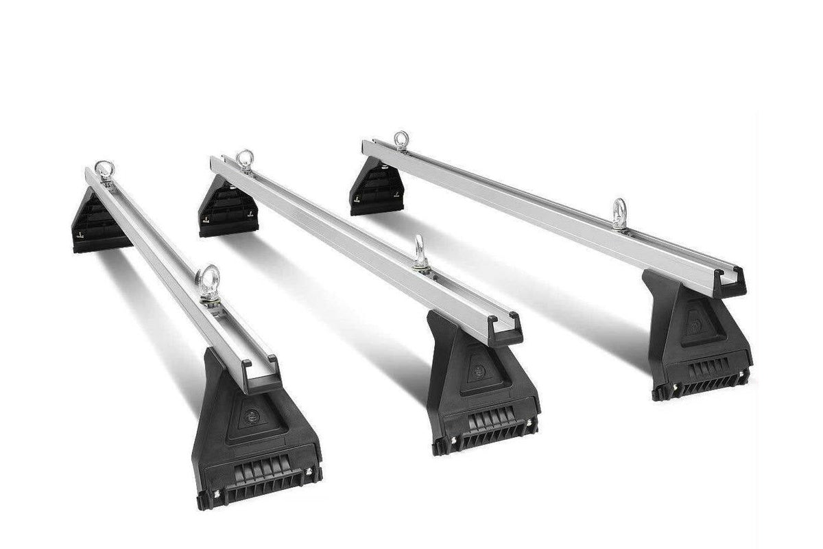 Universal car roof racks mounted on a silver 4WD roof