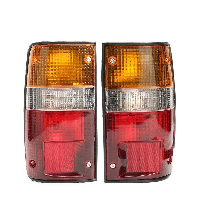 Toyota Hilux tail lights pair showing front view in red and clear