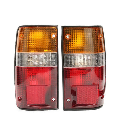 Toyota Hilux tail lights pair showing front view in red and clear