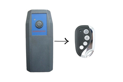 Side angle of Dominator garage remote showing slim metal frame