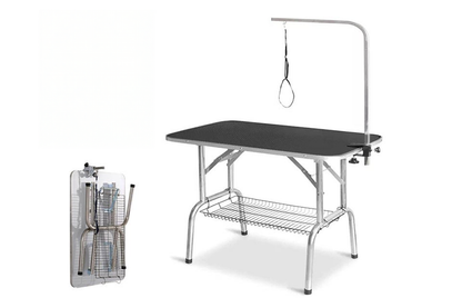 Side view of pet grooming table with adjustable arm