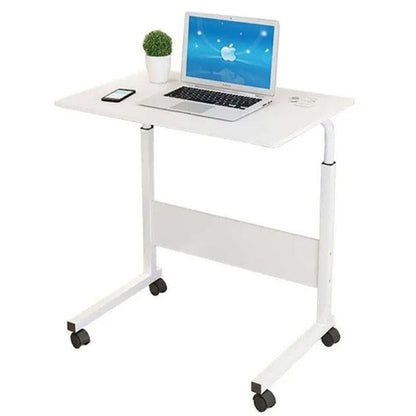 Laptop computer desk bedside view with white MDF surface