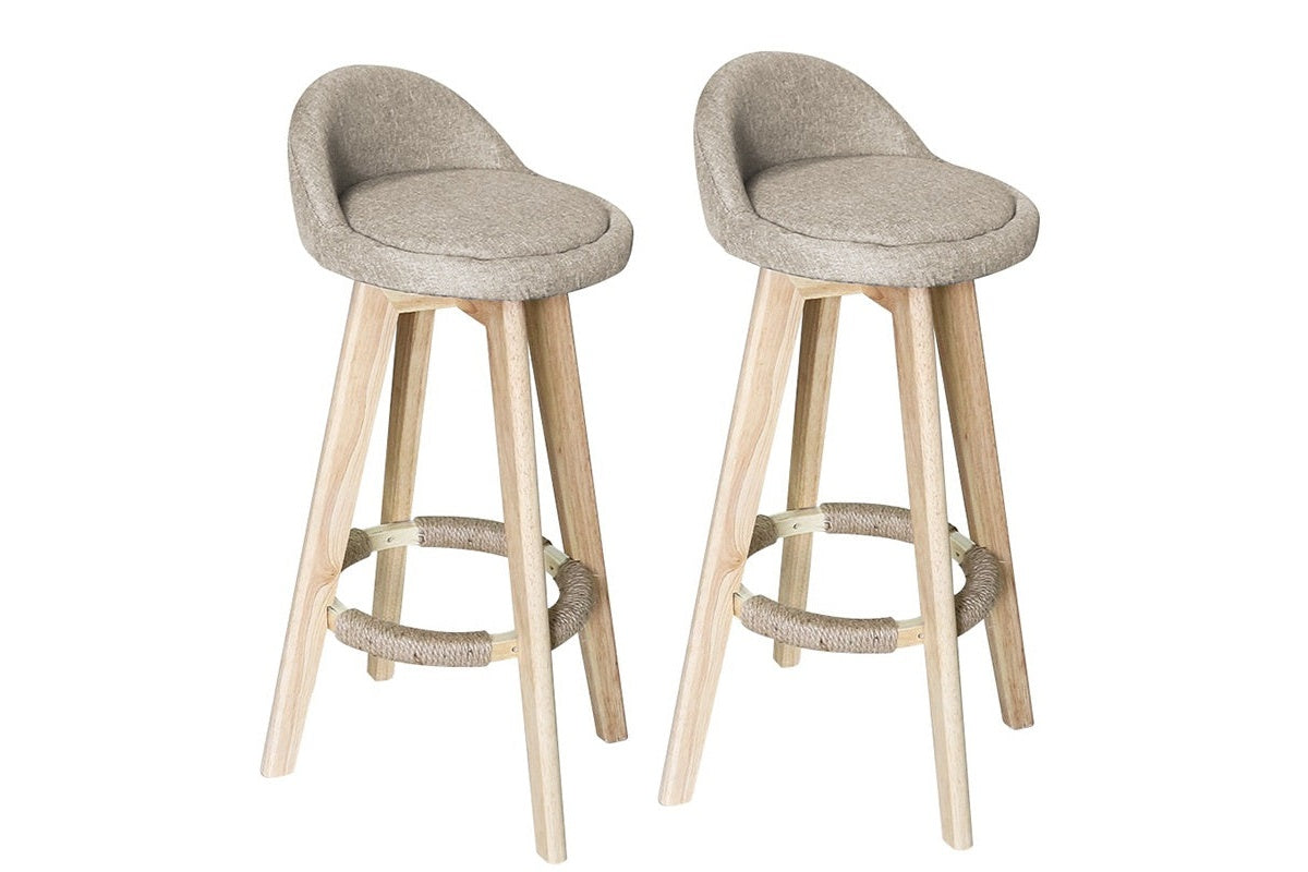 Swivel bar stools in cream with polished chrome footrest