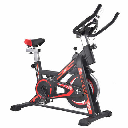 Exercise bike side view showing blue steel frame