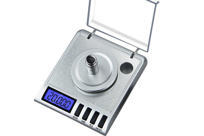 Close up of stainless steel platform on digital scale 50g