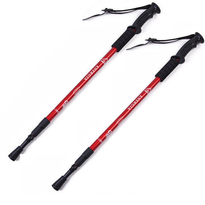 Close up of red aluminium trekking pole with quick lock feature