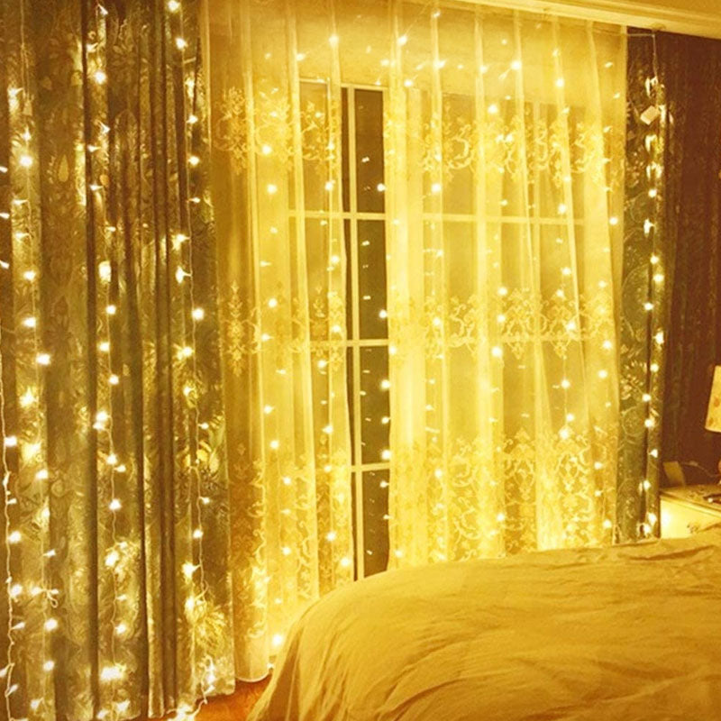 Curtain lights warm white 3 x 6m full view on wall
