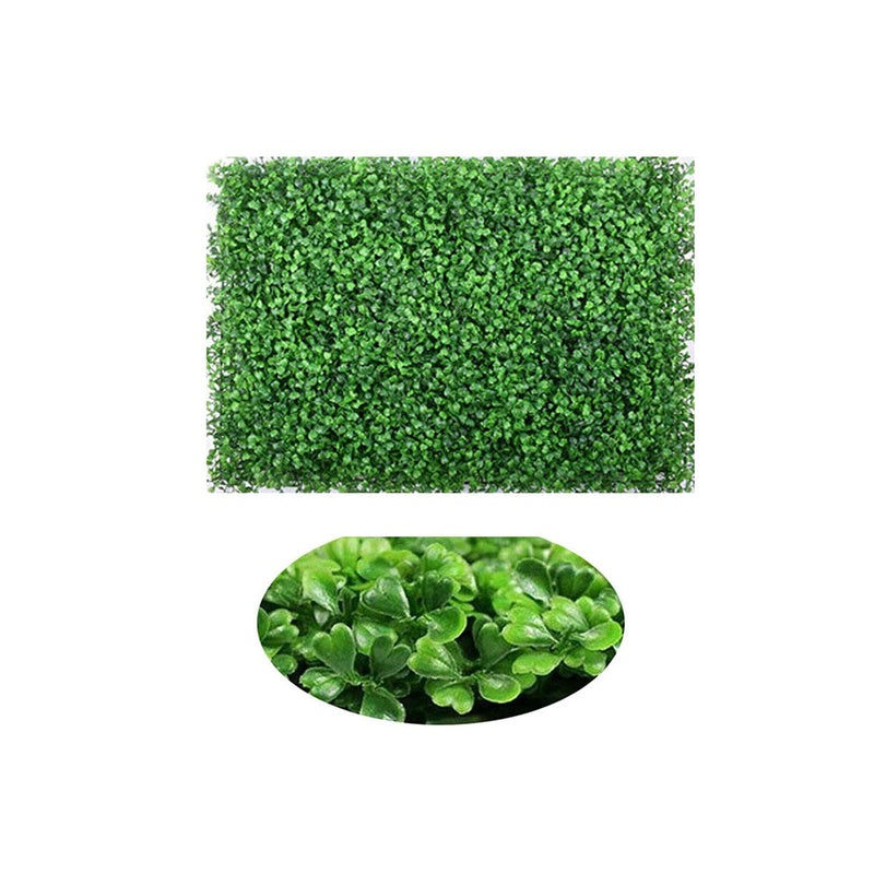 Artificial hedge wall panel close-up showing green foliage detail