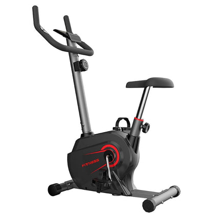Exercise bike upright view showing steel frame and pedals