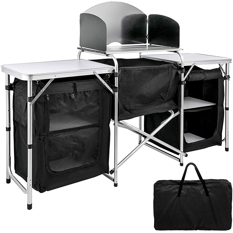 Camping kitchen showing aluminium tabletops and storage cupboards