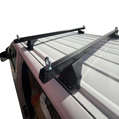 Car roof rack cross bar setup on 4WD for camping gear transport