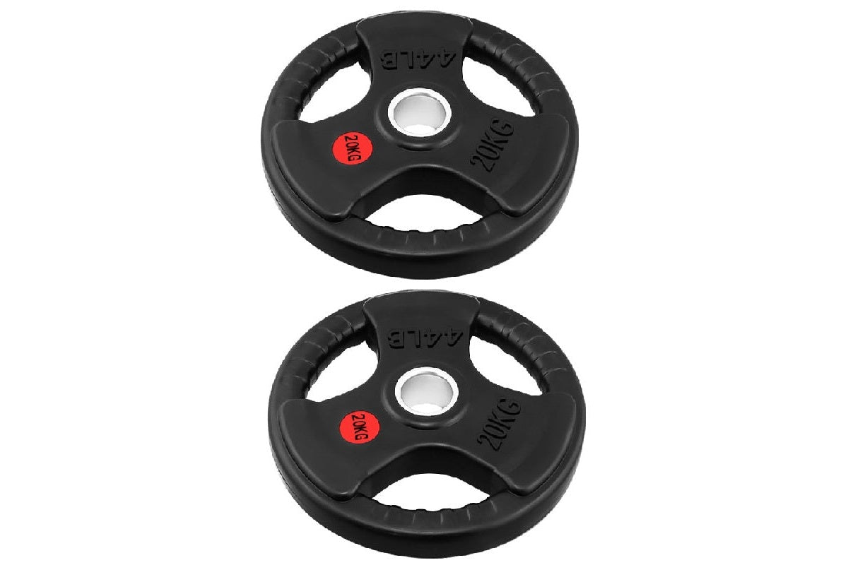 Side view of Olympic bumper weight plate showing thickness