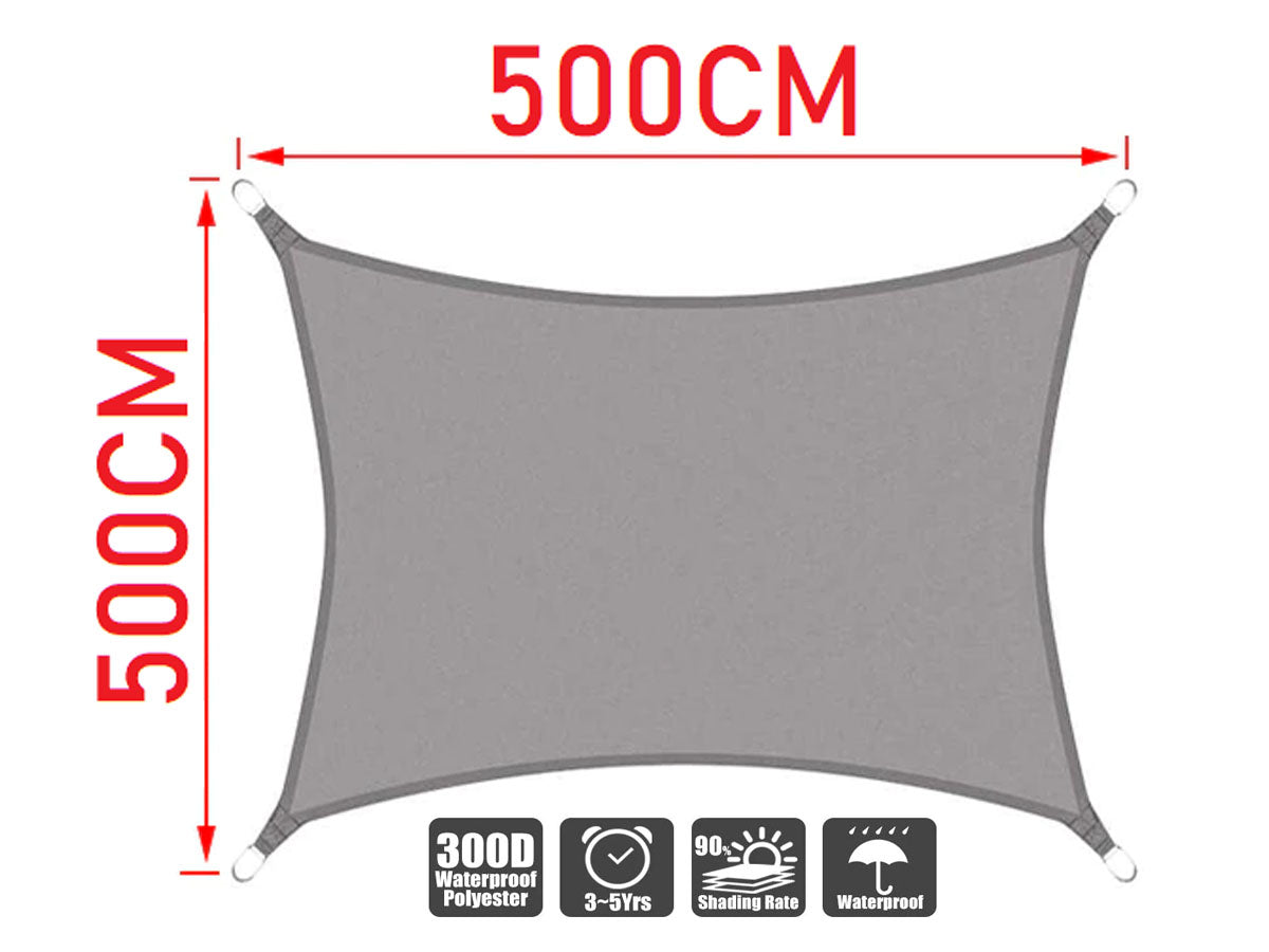 Sun shade sail in use over an outdoor barbecue area