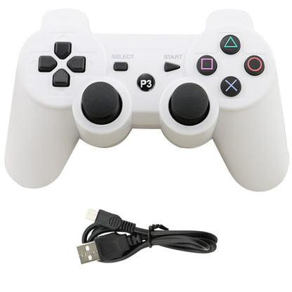Wireless PS3 controller showing front buttons and ergonomic grip