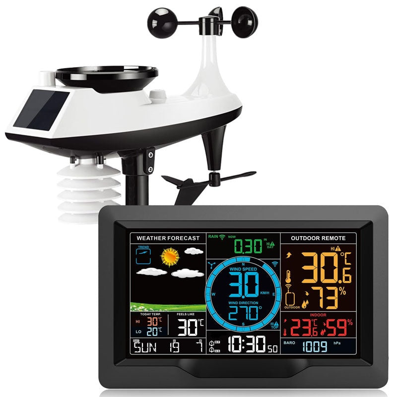 Wireless weather station showing digital LCD display with time and date