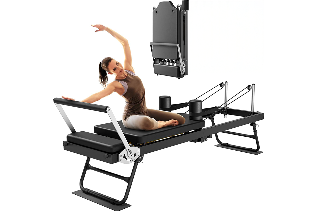 Close up of Pilates reformer machine metal frame and footrest