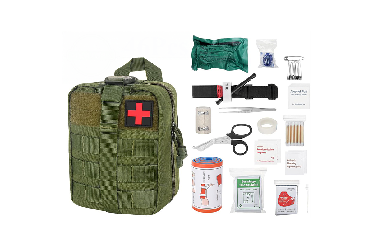 First aid kit open showing bandages and medical tape