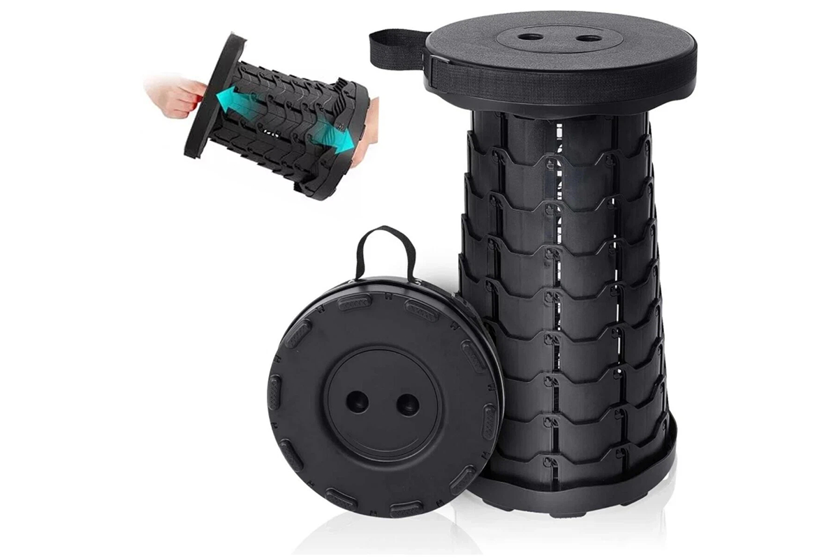 Side view of folding telescopic stool with adjustable height