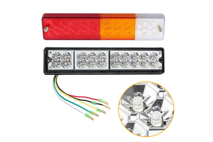LED trailer tail light installed on a trailer in daylight
