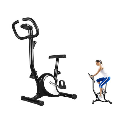Foldable exercise bike showing compact upright design