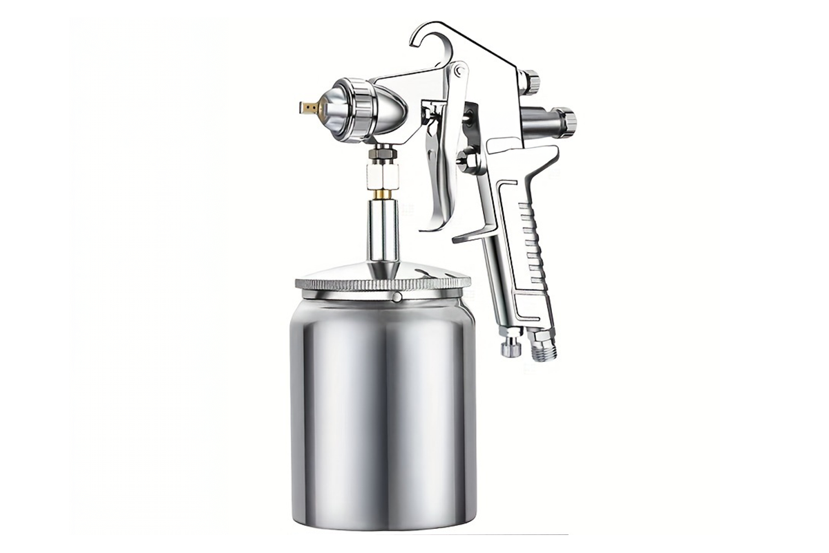 Close up of stainless steel nozzle on airless paint sprayer