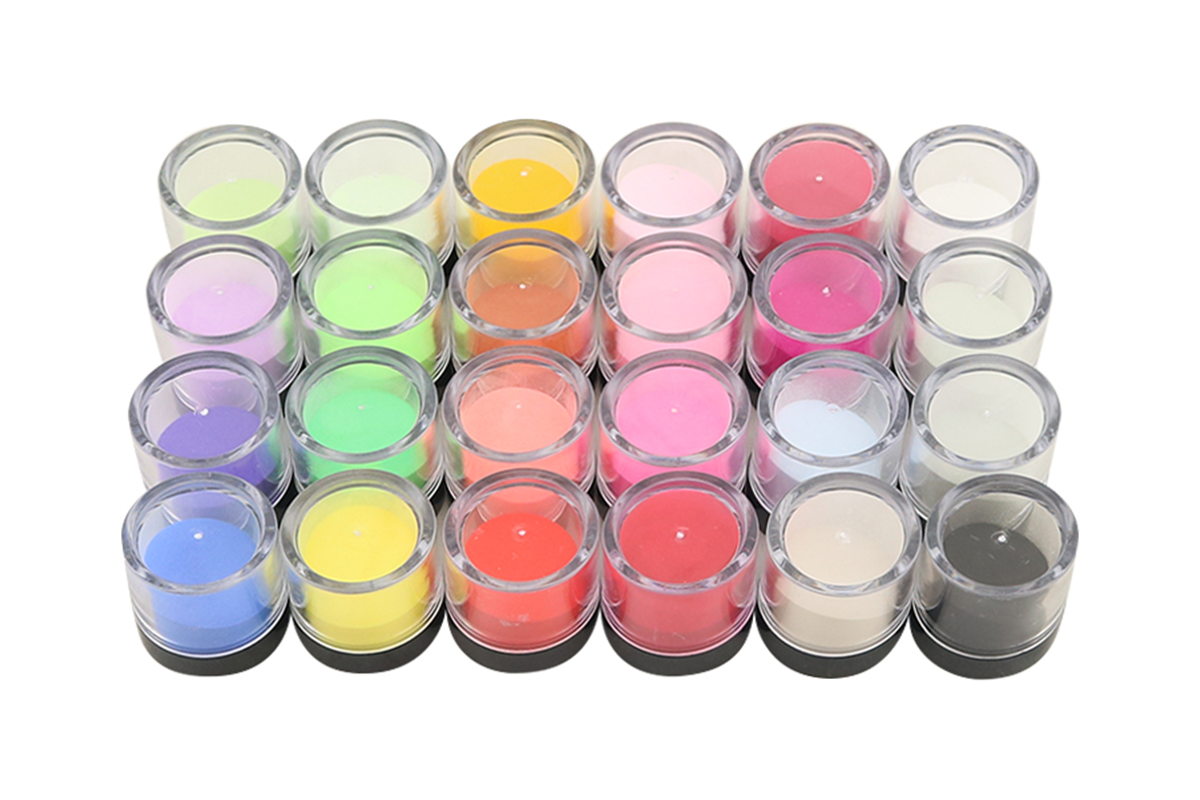 Close-up of nail dip powder kit with smooth finish