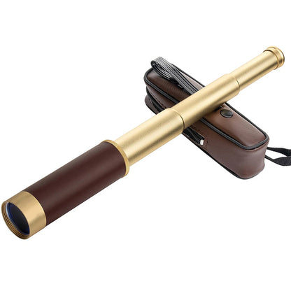 Golden monocular telescope showing front lens detail